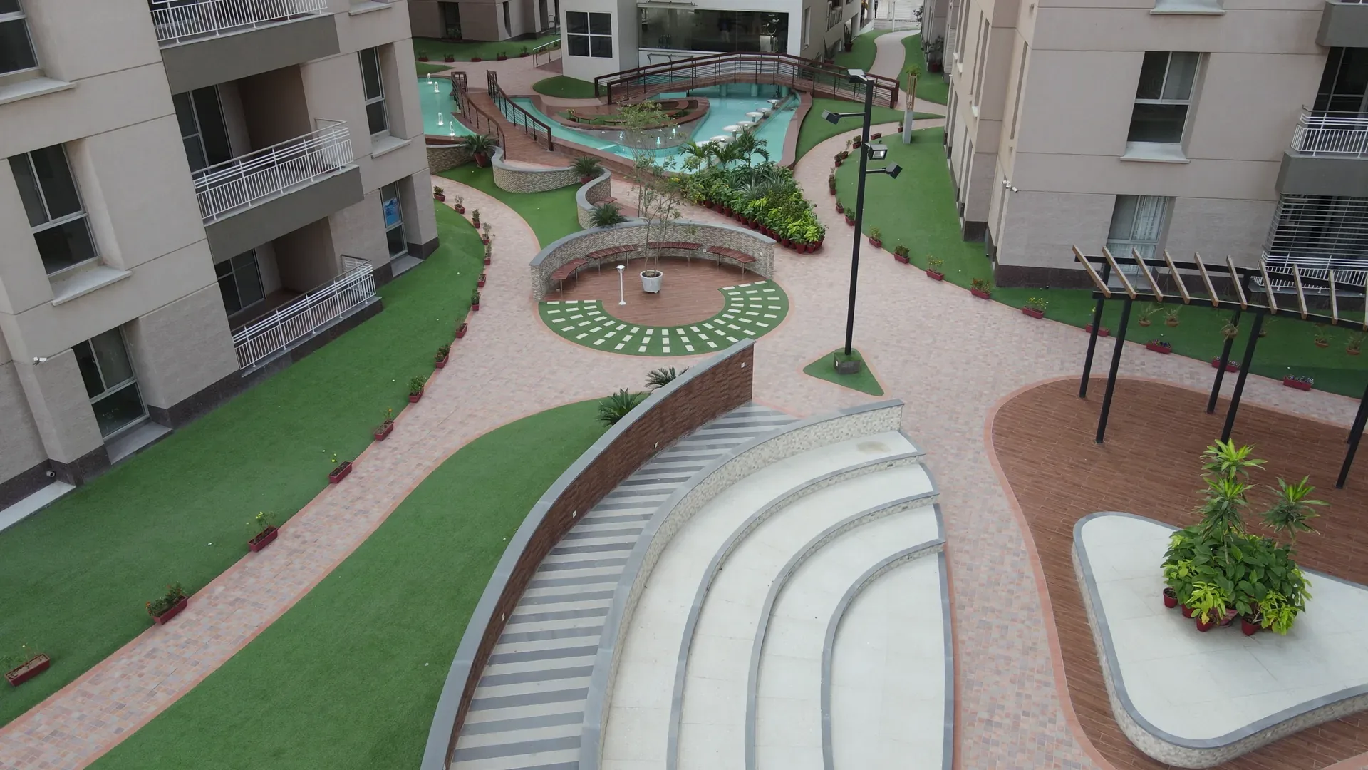 Terraced steps and gardens running between the towers.